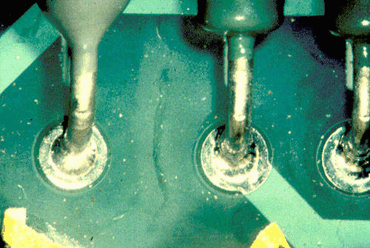 Figure 3: Adhesive contamination on the pad surface caused this solder skip Figure 3: Adhesive contamination on the pad surface caused this solder skip